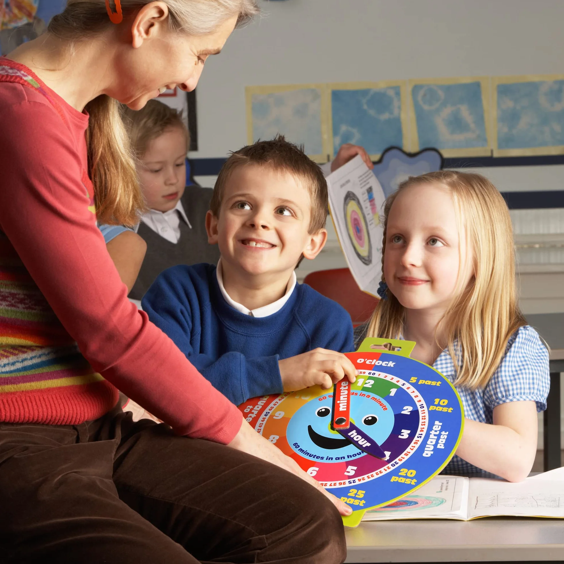 Morgan's Direct Orologio educativo con mani mobili e faccina sorridente. Facile da usare e resistente per i bambini piccoli, nonché portatile.