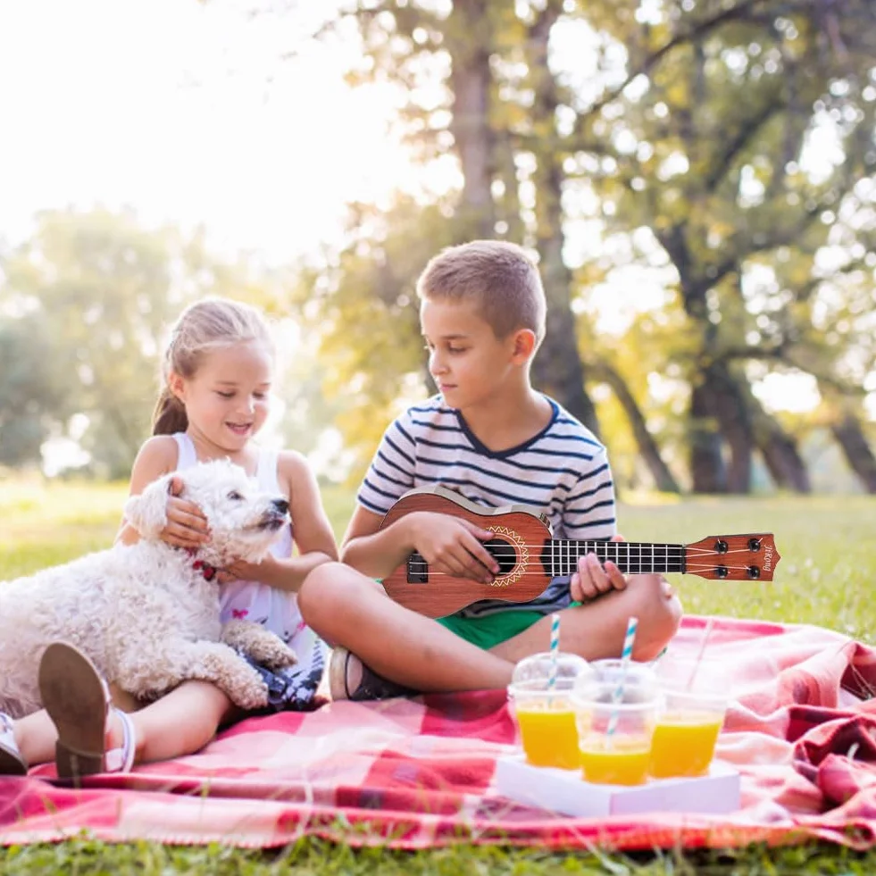 Ukulele giocattolo per bambini 36cm 4 corde regolabili strumento musicale educativo regali