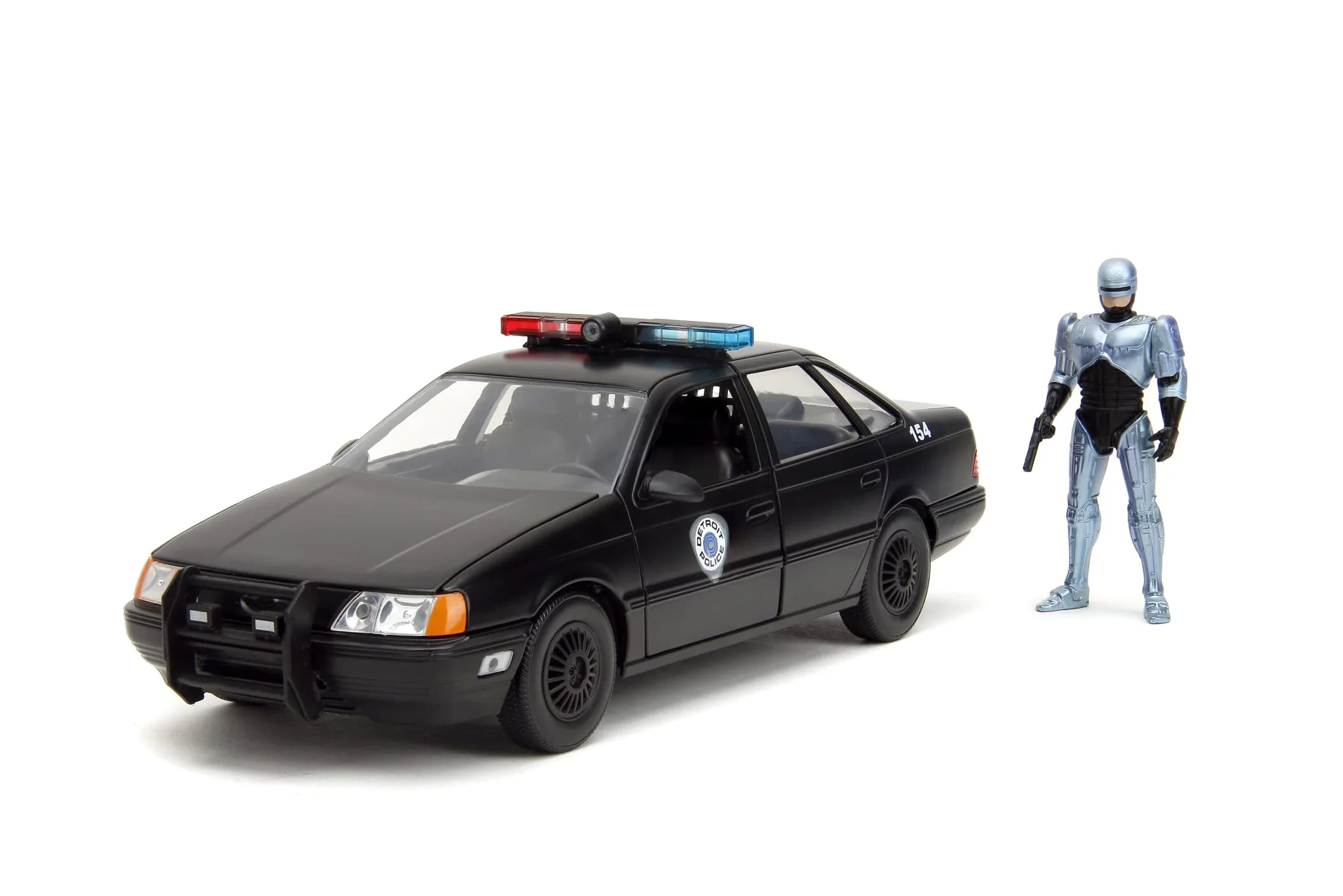 Jada - Robocop 1986 Ford Taurus, 253225060, +8 anni, in metallo pressofuso, in scala 1:24, parti apribili, sistema a ruota libera, personaggio incluso