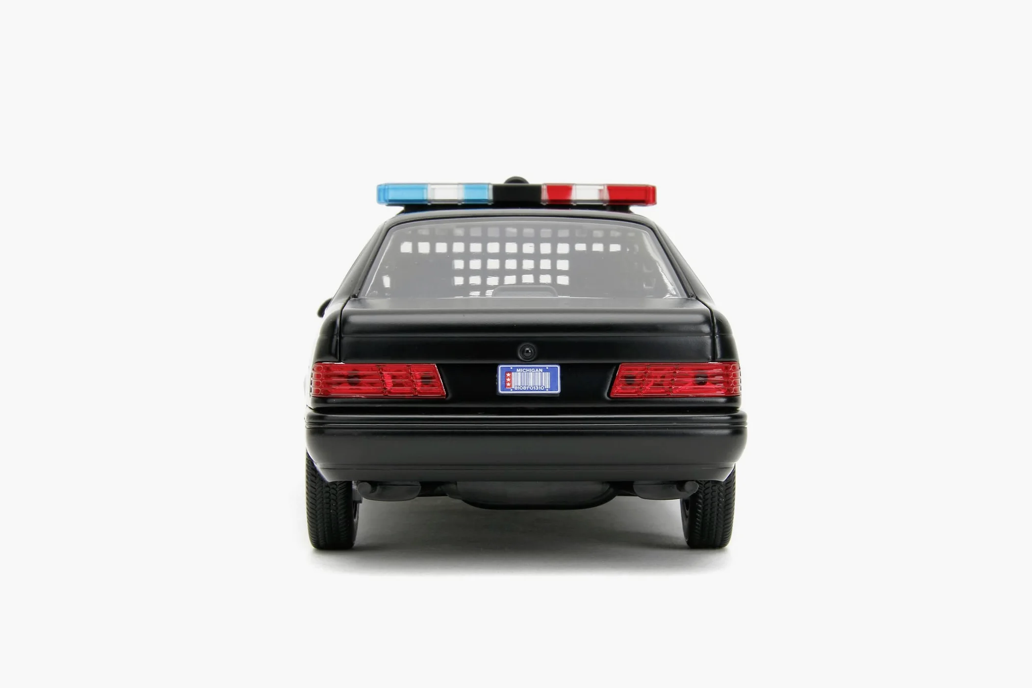 Jada - Robocop 1986 Ford Taurus, 253225060, +8 anni, in metallo pressofuso, in scala 1:24, parti apribili, sistema a ruota libera, personaggio incluso